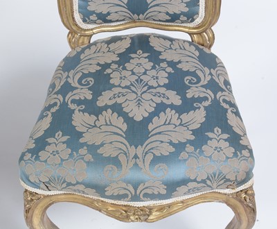 Lot 1087 - Two Georgian gold painted salon chairs
