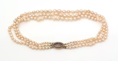 Lot 300 - A triple row graduated cultured pearl necklace