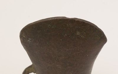 Lot 873 - Bronze age loop and socketed axe head