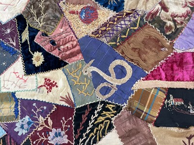 Lot 1282 - A museum-quality Victorian crazy pattern patchwork quilt