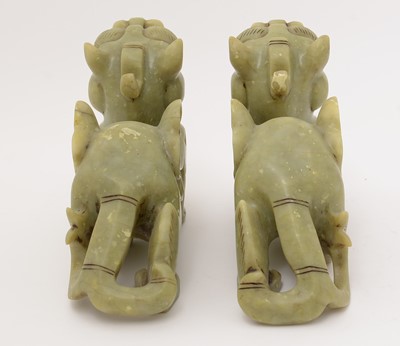 Lot 740 - pair of Chinese soapstone dragons.