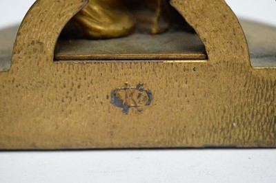 Lot 398 - A pair of Art Deco brass enamelled bookends
