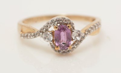Lot 7 - A pink sapphire and diamond ring