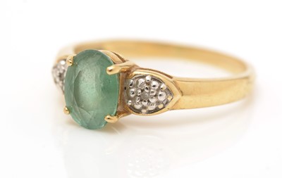 Lot 244 - A peridot and diamond ring, and a green apatite and diamond ring