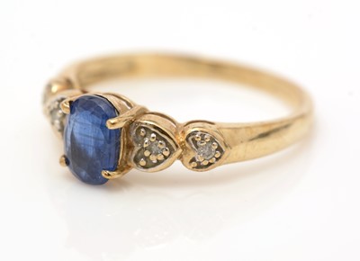 Lot 56 - A sapphire and diamond ring