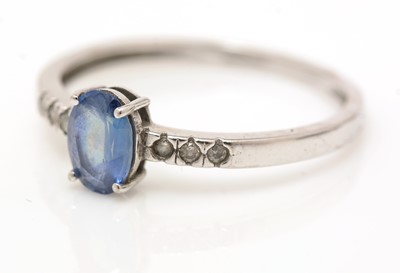 Lot 57 - A sapphire and diamond ring