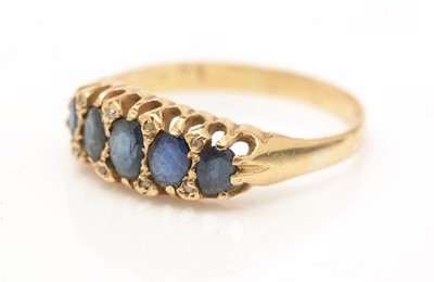 Lot 58 - A sapphire and diamond ring