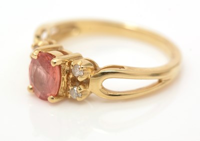 Lot 71 - A pink sapphire and diamond ring