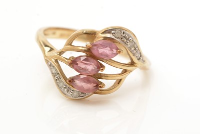 Lot 81 - A pink topaz and diamond ring