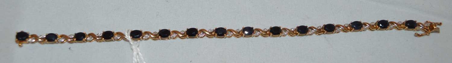 Lot 308 - A sapphire and diamond bracelet