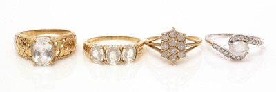 Lot 101 - Four white sapphire rings