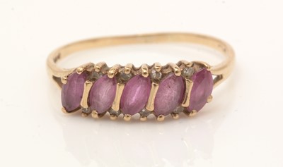Lot 103 - Five ruby and white stone rings