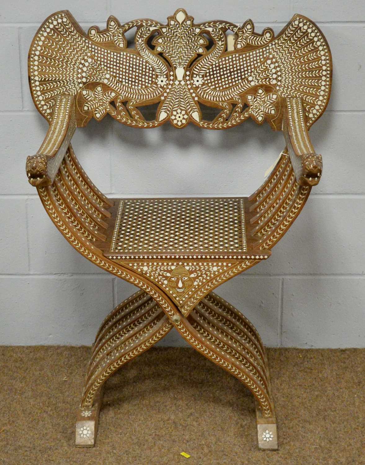 Lot 35 - An Indian Savonarola chair
