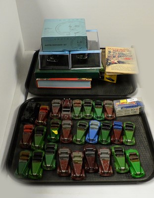Lot 324 - A selection of model vehicles and automobile related items
