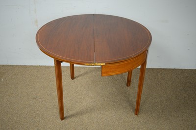 Lot 54 - A Georgian mahogany and banded demi-lune tea table