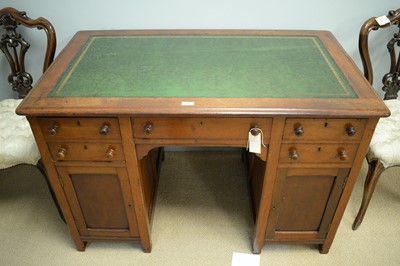 Lot 126 - Victorian mahogany kneehole desk.