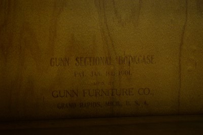 Lot 89 - An oak three-tier bookcase by Gunn Furniture Co., USA.