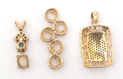 Lot 146 - Three gemset pendants, one with opal, topaz...