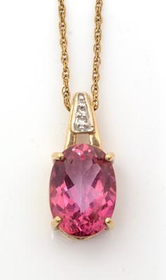 Lot 148 - A pink topaz and white stone pendant