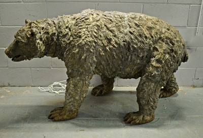 Lot 603 - A contemporary bronze garden sculpture of a bear.