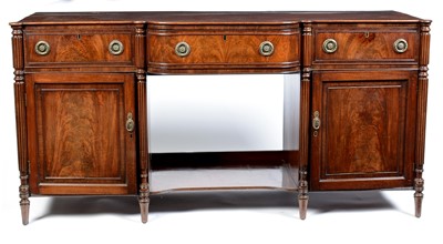 Lot 1081 - A 19th Century mahogany breakfront sideboard.