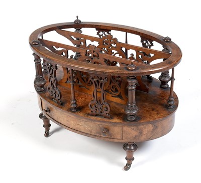 Lot 1015 - A Victorian burr walnut canterbury.