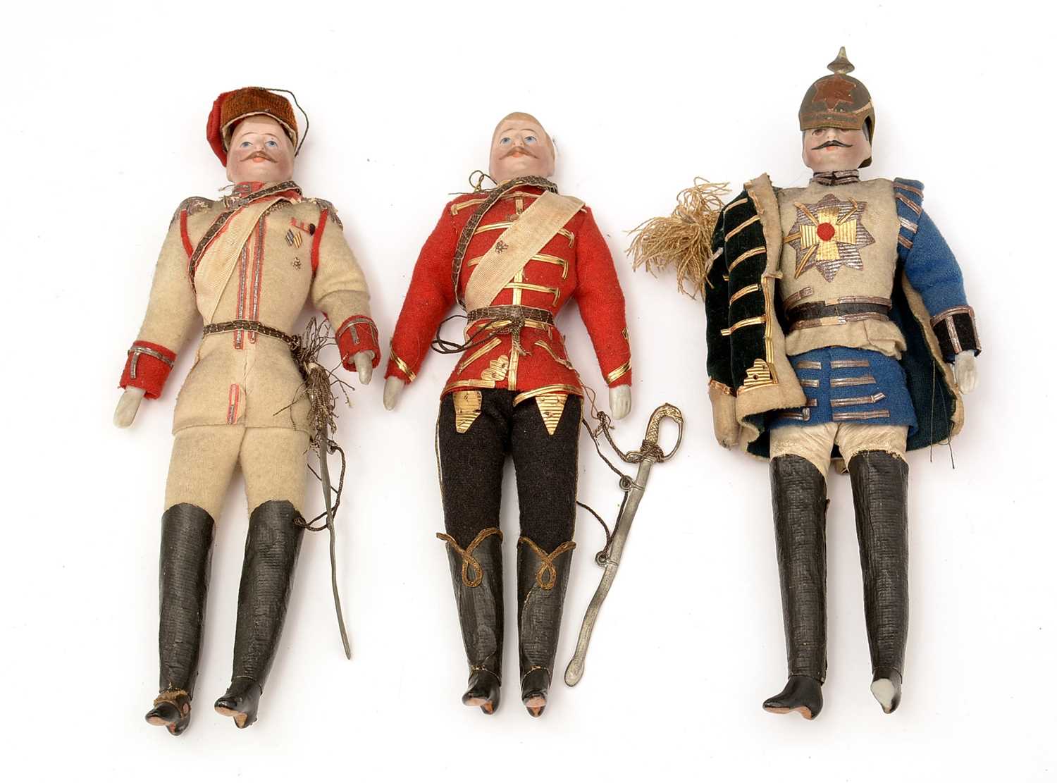 Lot 1119 - Three late 19th/early 20th Century bisque-headed military dolls