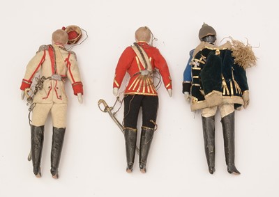 Lot 1119 - Three late 19th/early 20th Century bisque-headed military dolls