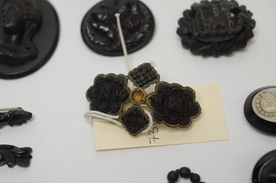 Lot 130 - A selection of jet and French jet brooches
