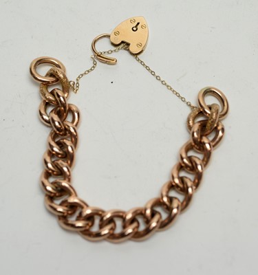 Lot 204 - A yellow metal curb link bracelet