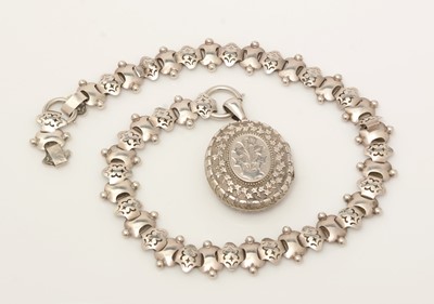 Lot 155A - A Victorian white metal locket pendant and chain