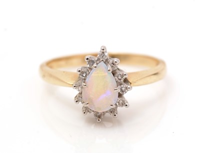 Lot 439 - An opal and diamond cluster ring