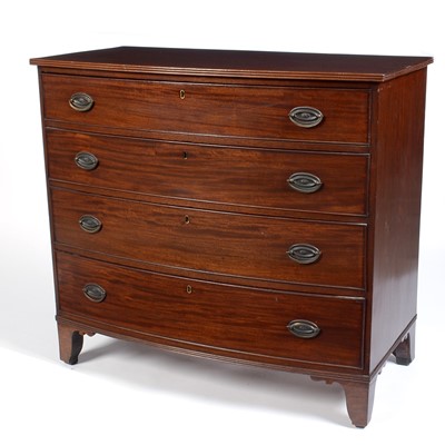 Lot 1040 - A Georgian mahogany bowfront chest