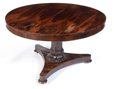 Lot 1047 - A Victorian rosewood tilt-action breakfast table.