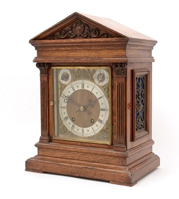 Lot 1002 - A late 19th C German oak bracket clock.