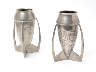 Lot 1016 - Archibald Knox (1864-1933) for Liberty & Co: a pair of Tudric pewter bomb pattern vases