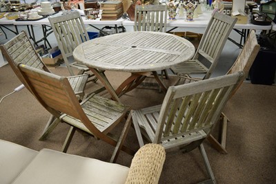 Lot 80 - Circular teak garden table; and seven garden chairs, various.