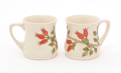 Lot 487 - Two Moorcroft mugs Sally Tuffin