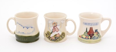 Lot 488 - Three Moorcroft mugs by Sally Tuffin