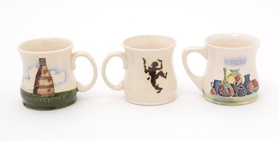 Lot 488 - Three Moorcroft mugs by Sally Tuffin