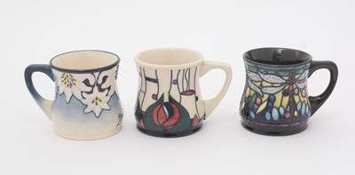 Lot 490 - Three Moorcroft mugs