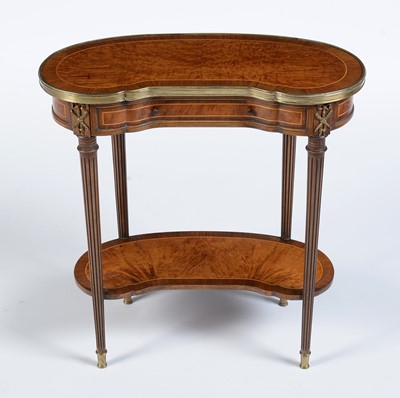 Lot 1088 - A Louis XVI style walnut and rosewood cross banded etagere