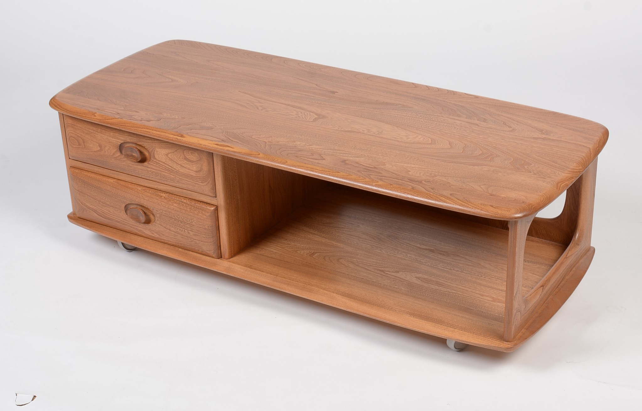 Lot 370 Ercol an elm 'Minerva' coffee table