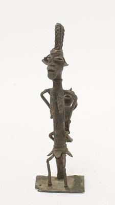 Lot 668 - Yoruba Mother and Child, and Ijebu-Ode figure / A group of Obo Ayegunle style figures