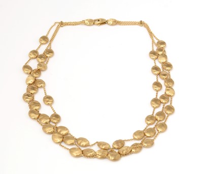 Lot 461 - Marco Bicego, Italy: an 18ct yellow gold triple row necklace