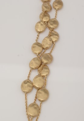 Lot 461 - Marco Bicego, Italy: an 18ct yellow gold triple row necklace