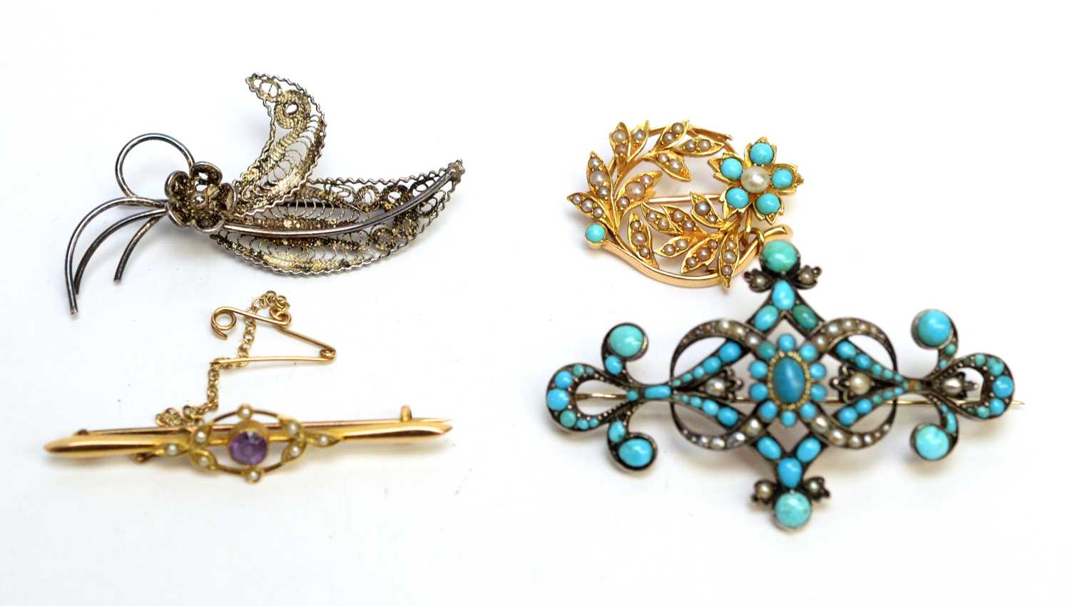 Lot 229 - Four Victorian and later brooches.