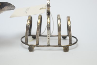 Lot 158 - Silver toast rack, sauce boat and mustard pot.