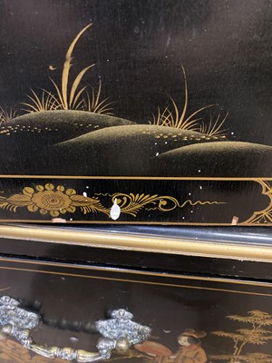 Lot 79 - A mid 20th Century black lacquered wardrobe decorated chinoiserie designs.