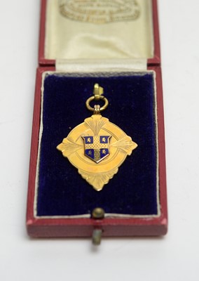 Lot 138 - A 9ct yellow gold fop medal